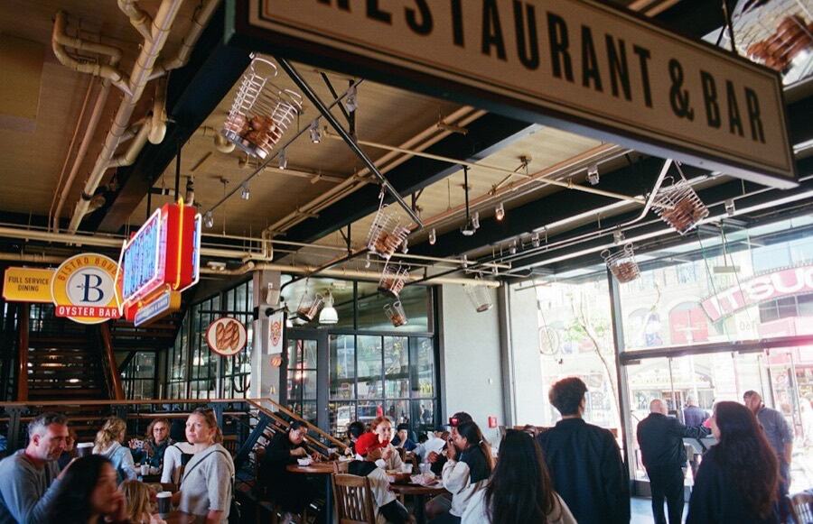 Busy restaurant and bar with people dining